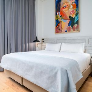 Kamer met een Queen Size Bed met de Toegang voor Gehandicapten